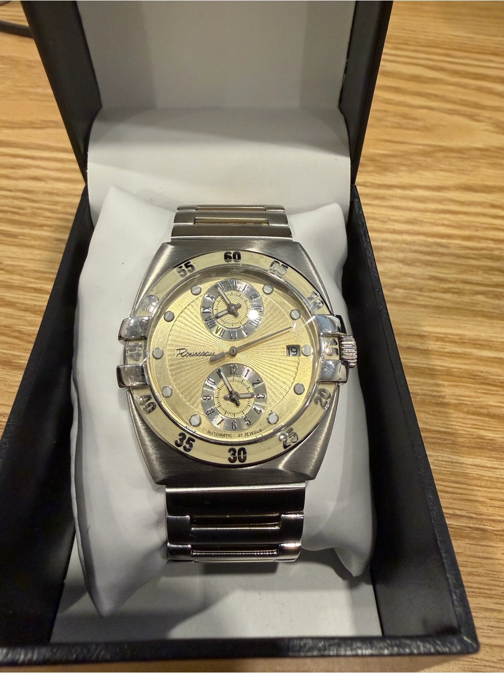 Brand new Rousseau watch, still has protective film on the face